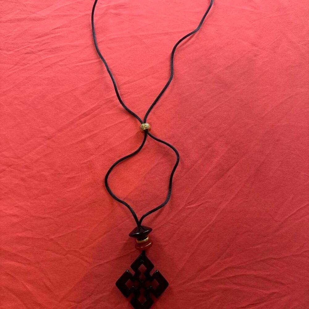 Black JLo by Jennifer Lopez pendant necklace w/ gold accents & geometric design